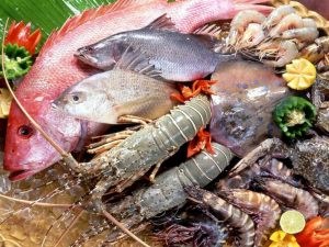 Seafood that includes shrimp, crab, swimming crab, clam, seaweed