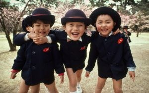 Japanese children playing in the sun even though the weather was 4°C